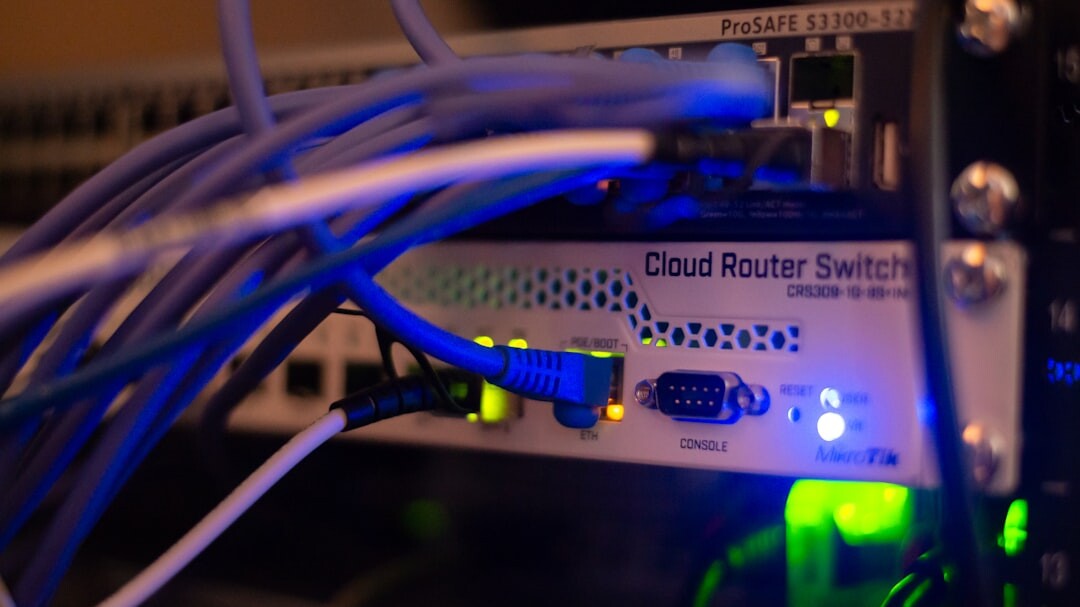 Server room with blue lighting and racks