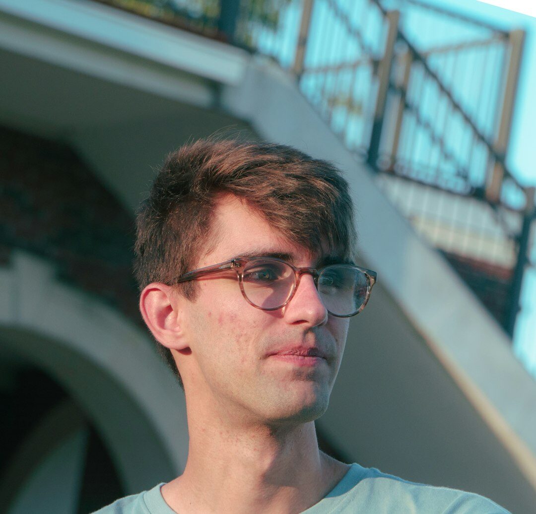 Professional Belgian male editor in glasses